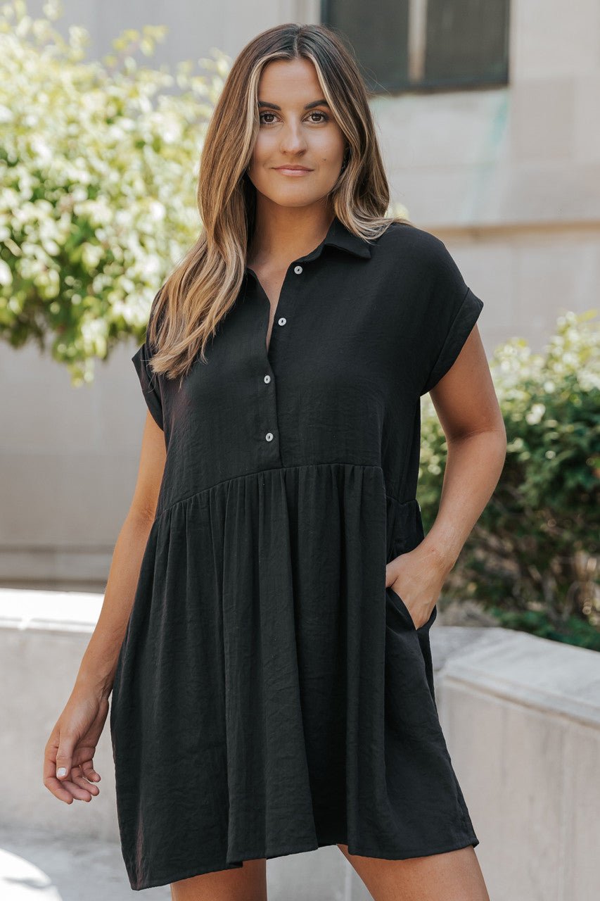 Woman wearing Back To Summer Black Button-Up Mini Dress with button front detail